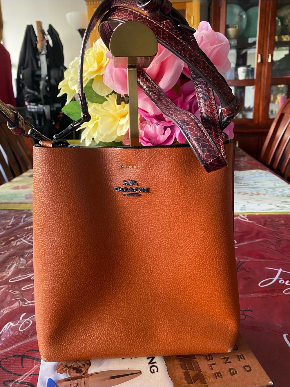 Coach Mollie Bucket Bag 22 in a sunset color with snake embossed strap